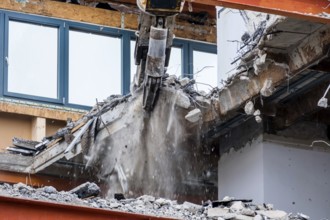 An older office building is demolished. Demolition instead of renovation Austria