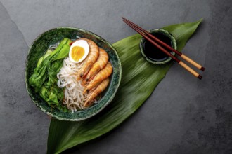 Food, Asian rice noodles with shrimps on gray background