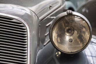 Headlight of old vintage car close-up