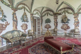 Masino, Italy, April 2023: baroque livingroom in old castle. Vintage interior, original from 18th
