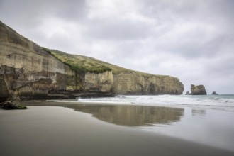 An image of the Tunnel Beach in New Zealand