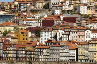 Colorful Houses of Porto Ribeira, Traditional Facades. Old Buildings with Red Roof Tiles in the