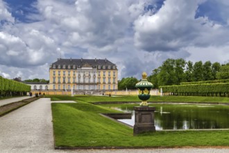 View of Augustusburg Palace with fountain and flower garden, Bruhl, Germany, Europe