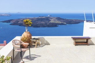 View from Fira to the volcanic island of Nea Kameni, Fira, Santorini Island, Cyclades, Greece,