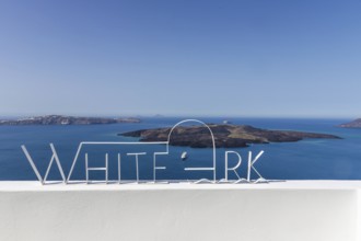 View from Fira to the volcanic island of Nea Kameni, Fira, Santorini Island, Cyclades, Greece,