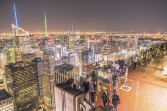 Rockefeller Center Observation Deck of the people and the night view. Shooting Location: New York,