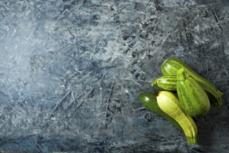 Vegetables on the background. Fresh vegetables (cucumbers, tomatoes, onions, garlic, dill, green
