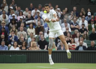Serbian tennis player Novak Djokovic in action at the 2024 Wimbledon Championships, London,