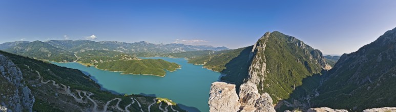 Bovilla reservoir near the capital of Tirana with setting sun in the back