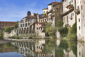 The medieval city constructed on rocks about the mountain river