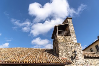 Old stone church in Puebla de la Sierra in the mountain range of Madrid