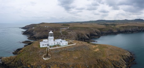 Aerial panorama landscape of the Pembrokeshire coast with the historic Strumble Head Lighthouse