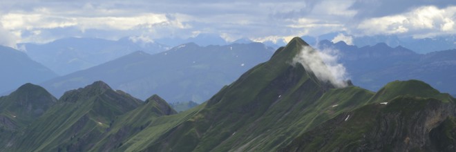 Cloud hanging on Mount Tannhorn and Rothorn Ridge, Switzerland, Europe