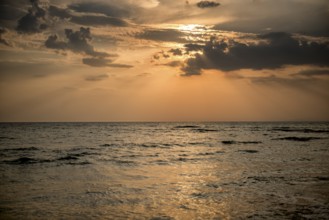A beautiful summer sunset on a beach in summer