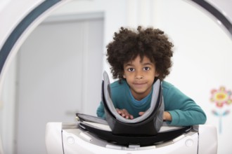 Belarus, city of Gomil, May 31, 2021. A child lies in an MRI machine. A boy in a magnetic resonance
