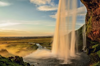 Seljalandsfoss waterfall at sunset in summertime, Iceland, Europe