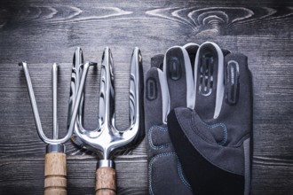 Stainless rake trowel fork protective gloves gardening concept