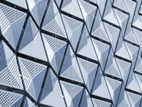Blue toned metallic geometric architectural cladding panels