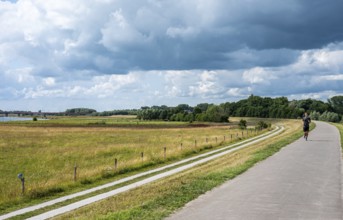 Zwolle, Overijssel, The Netherlands, 07 15 2022, Bicycle path at the dike of the River Ijssel flood