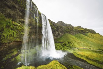 Gljufrafoss, or Gljufrabui, waterfall, a small waterfall hidden on a narrow canyon near the more