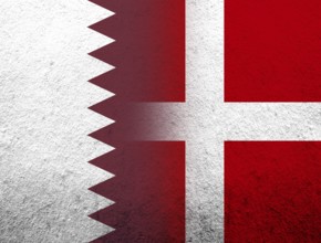 The Kingdom of Denmark National flag with The State of Qatar National flag. Grunge Background