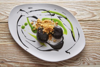 Molecular gastonomy cuttlefish roes with citrus mayonnaise