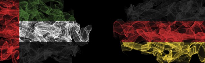 Flags of UAE and Germany on Black background, UAE vs Germany Smoke Flags