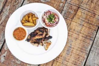Piri piri portuguese roast chicken with african jindungo spicy sauce meal
