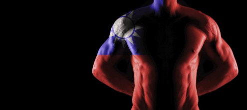 Taiwan flag on muscled male torso with abs, black background