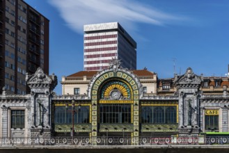 Bilbao, Spain, February 13, 2022: Bilbao-Concordia railway station on the riverside of the estuary