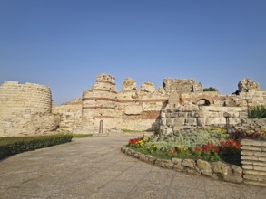 Ancient ruins of Nessebar, weathered brick and stone walls remnants of Byzantine fortress structure