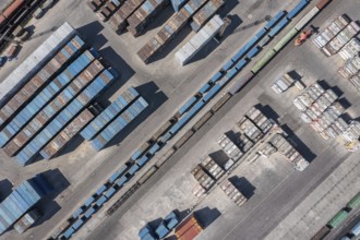 Aerial top view of cargo container terminal with railway, business transportation logistic in trade