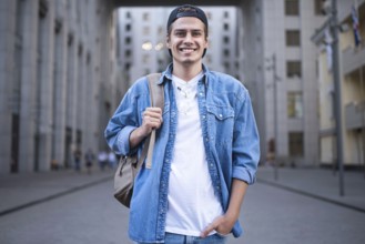 Background on the street while waiting his colleagues. Businessman wearing casual white shirt and