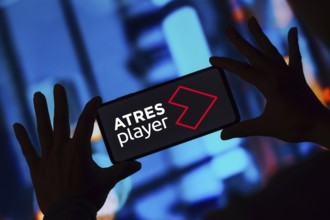 In this photo illustration, the ATRESplayer logo is displayed on a smartphone screen
