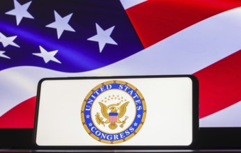 In this photo illustration the United States Congress logo seen displayed on a smartphone screen,