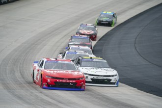 Jesse Love races for position for the BetRiver 200 in Dover, DE, USA, North America