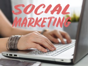 Social marketing concept. Close-up woman's hands using laptop keyboard for social media