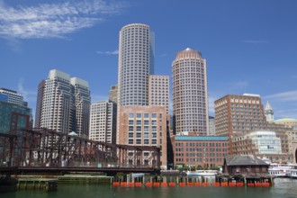 Boston skyline and Northern Avenue Bridge. Built in 1908, it was closed to vehicle traffic in 1999