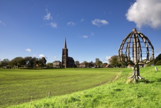 Artworks in the form of a tree along the dike of the river Maas near Batenburg in the province of
