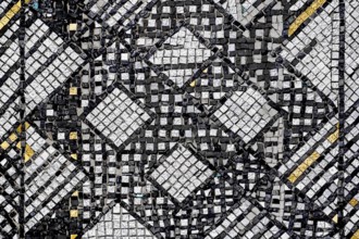 Background from a mosaic of silver and gold stones Shumen, Bulgaria, Europe