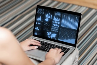 Woman Sitting With Laptop Upper Back View Working From Home