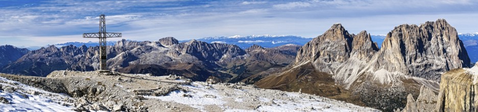 Panoramic photo with summit cross of the Saß Pordoi, in the Dolomites, South Tyrol, Italy, Europe
