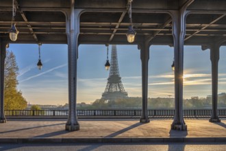 Paris France, sunrise city skyline at Eiffel Tower and Seine River Bir-Hakeim Bridge