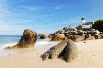 Scenic view of beach with the lighthouse of Pontuvel, Finistere, Brittany, France, Europe