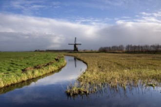 Dutch polder landscape with a windmill in the region Alblasserwaard