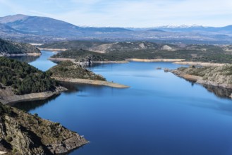 The Atazar reservoir and dam in the mountain range of Madrid