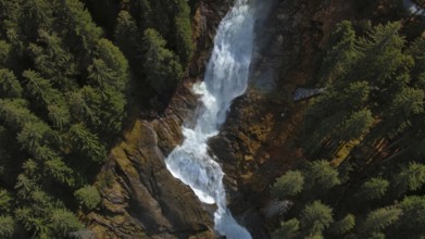 Aerial view of Krimml Waterfalls on sunny day. High Tauern National Park, Austrian Alps, Austria,