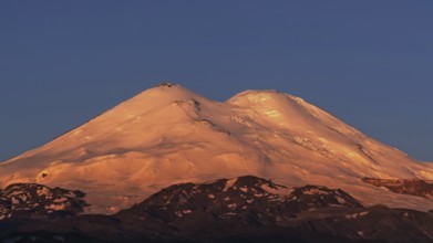 Beautiful view of Mount Elbrus at sunrise, North Caucasus mountains, Russia, Europe