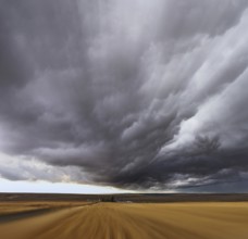 Thunderstorm above fields after harvesting. A Mirage on high speed