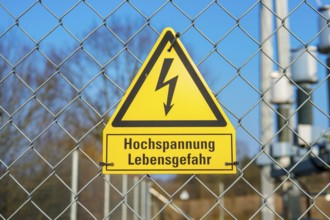 Yellow sign High voltage Danger to life
